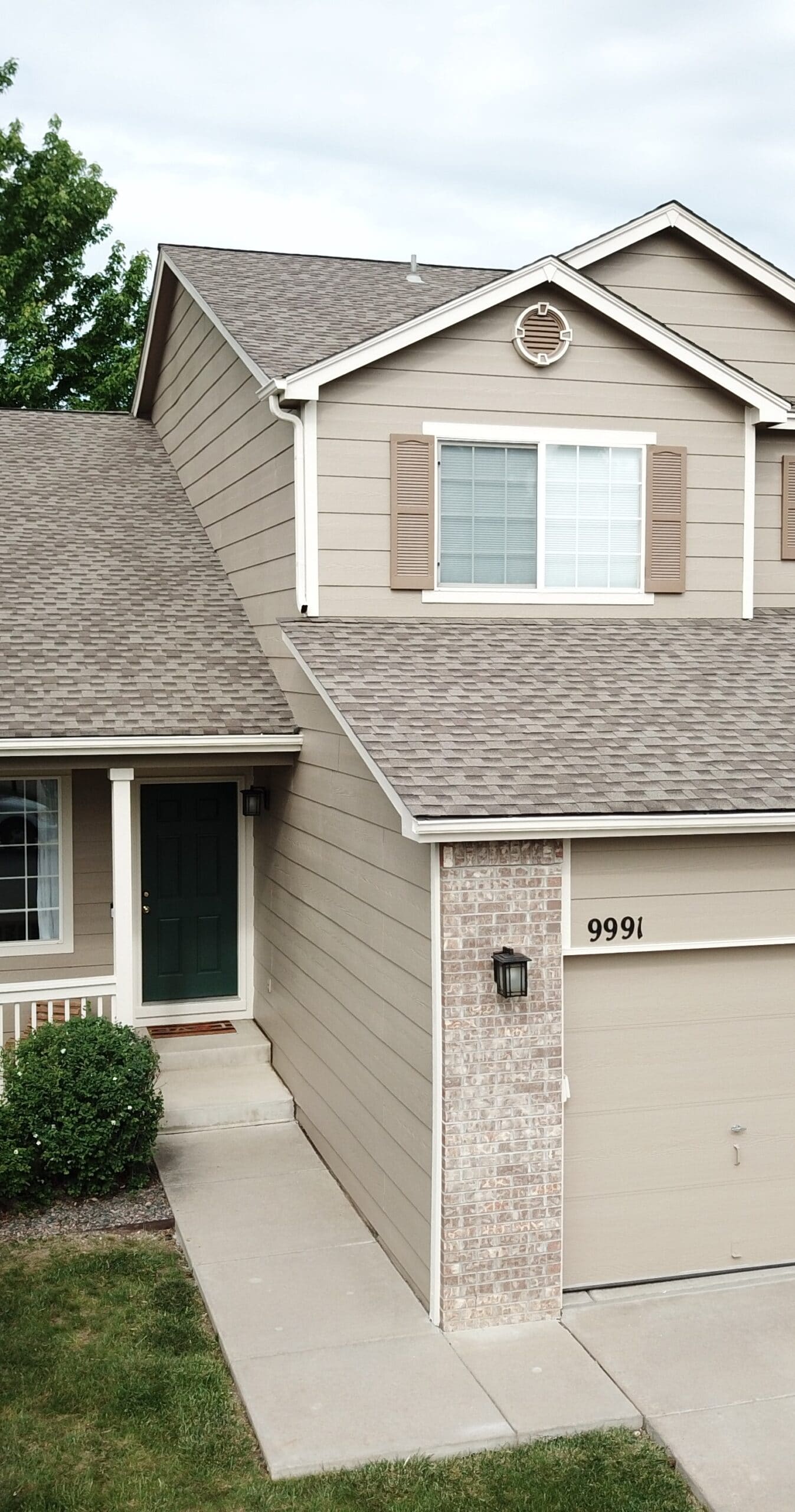 exterior house painted in white and beige paint color